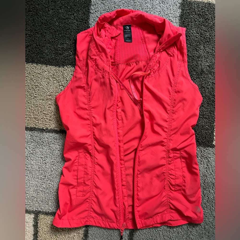 Womens MPG full zip lighweight vest with rusched back and reflective strip